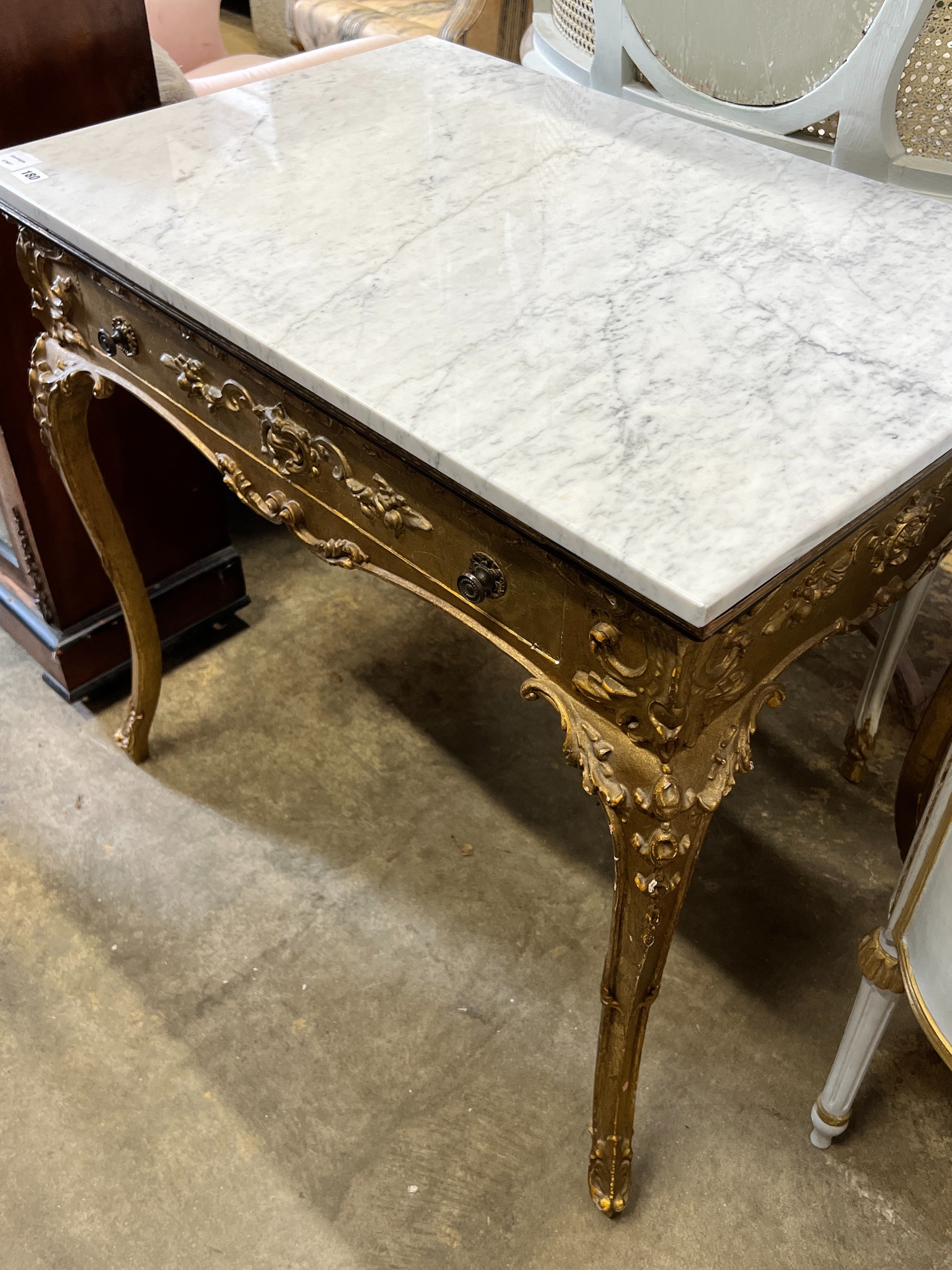 A giltwood and gesso marble topped side table, width 85cm, depth 57cm, height 80cm